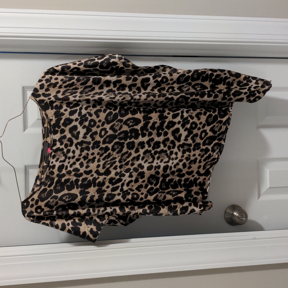 Asymmetric animal print top